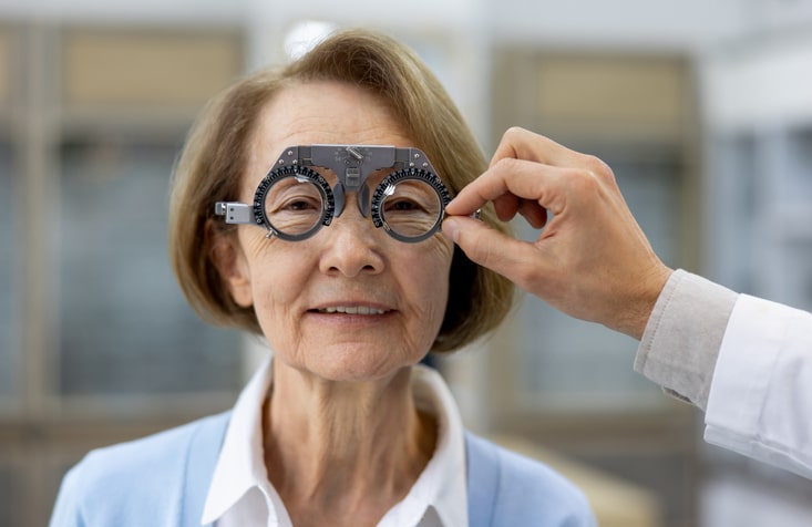 Portrait of a senior woman getting an eye exam at the ophthalmologist